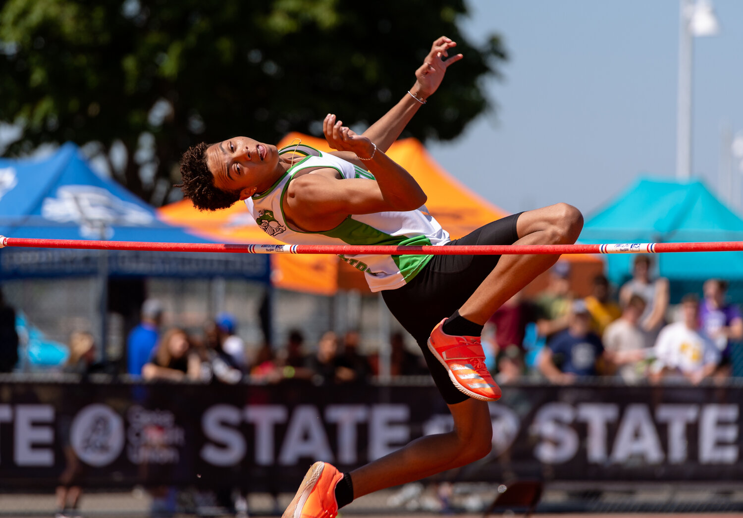 Tumwater’s Jayden Thomas bends backward to clear the bar during the 2A boys high jump at the WIAA 2A/3A/4A State Track and Field Championships on Friday, May 26, 2023, at Mount Tahoma High School in Tacoma. (Joshua Hart/For The Chronicle)